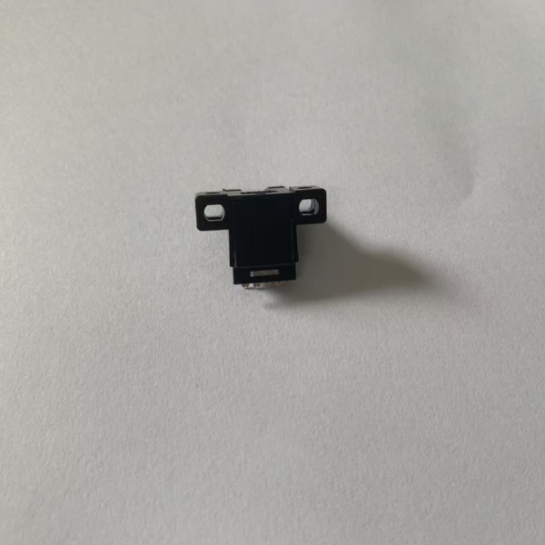 Omron EE-SX671A slot-type photoelectric sensor with 5mm through-beam and NPN output for automation detection.