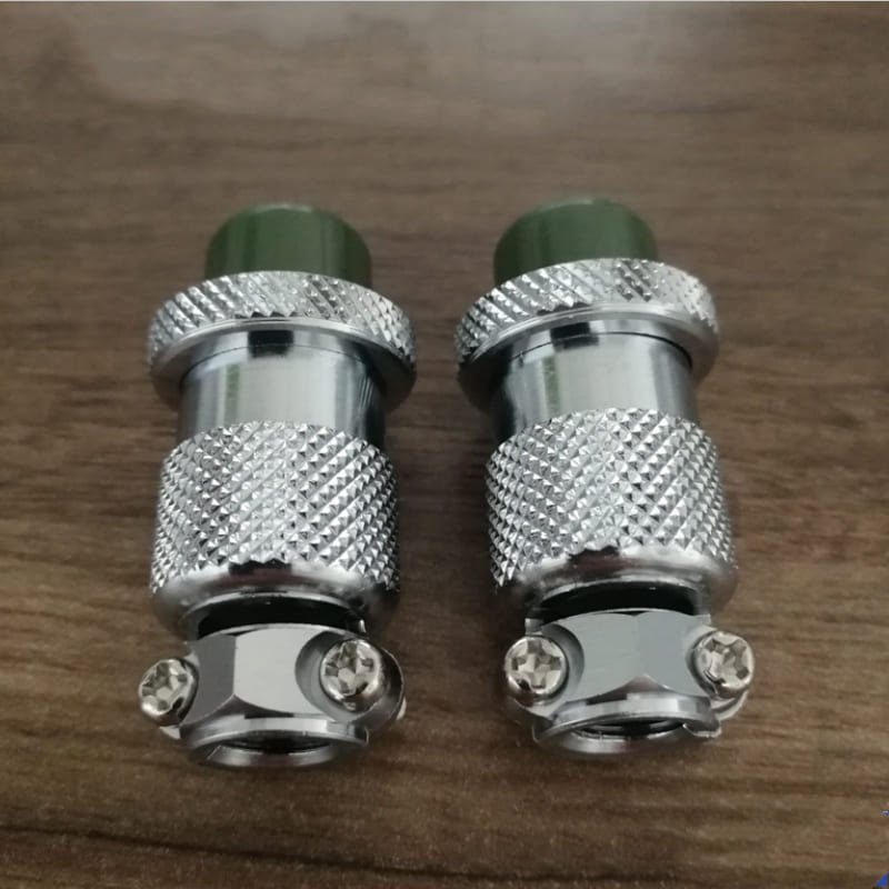 Musashi Engineering MC-1604P metal connector for precision dispensing systems.